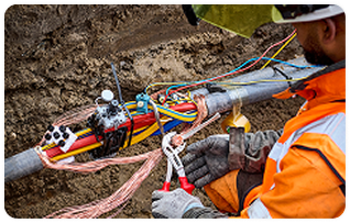 Electrician working with cables